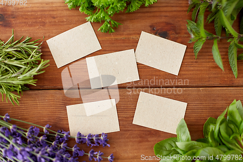 Image of greens, spices or medicinal herbs on wood