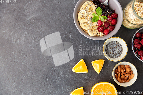 Image of cereal with berries, fruits, nuts and poppy seeds