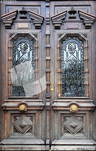 Image of Old artistic wooden door with decorative elements