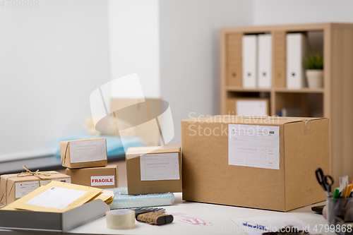 Image of parcel boxes and packing stuff at post office