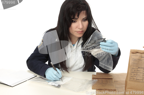 Image of CSI documenting evidence