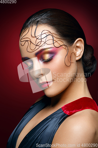 Image of beautiful woman with bright makeup