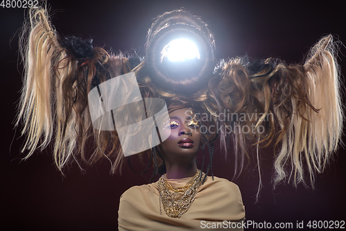 Image of beautiful girl with art hair composition