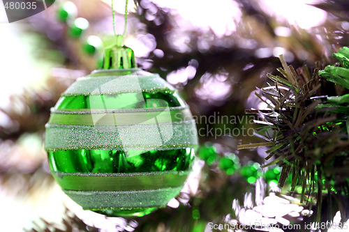 Image of Christmas ornaments on tree.