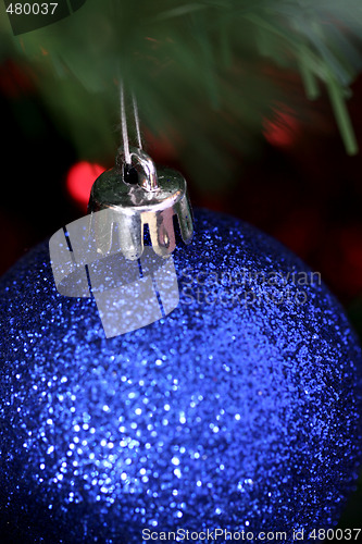 Image of Christmas ornaments on tree.