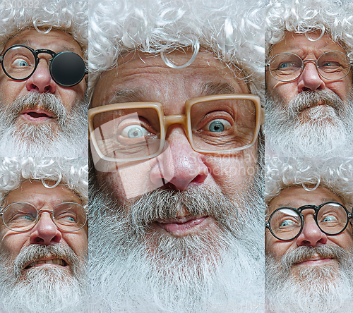 Image of Emotional Santa Claus in eyewear greeting with New Year and Christmas