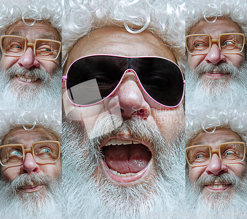 Image of Emotional Santa Claus in eyewear greeting with New Year and Christmas