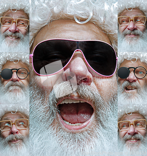 Image of Emotional Santa Claus in eyewear greeting with New Year and Christmas