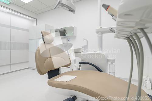 Image of patient chair in Interior of dentistry medical office