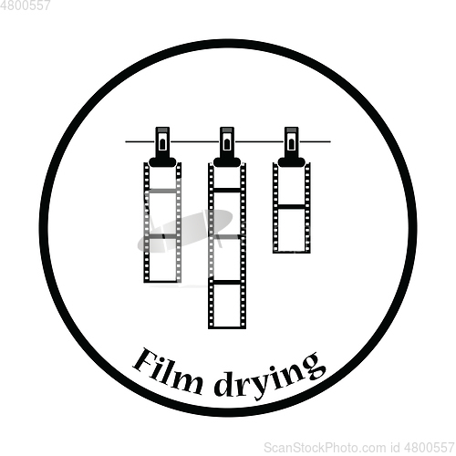 Image of Icon of photo film drying on rope with clothespin