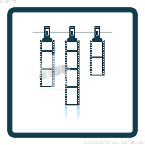 Image of Icon of photo film drying on rope with clothespin