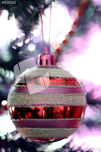 Image of Christmas ornaments on tree.