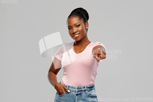 Image of african american woman pointing finger to you