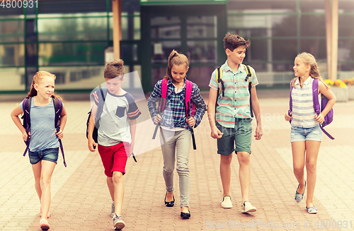 Image of group of happy elementary school students walking