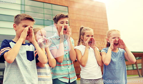 Image of group of happy elementary school students