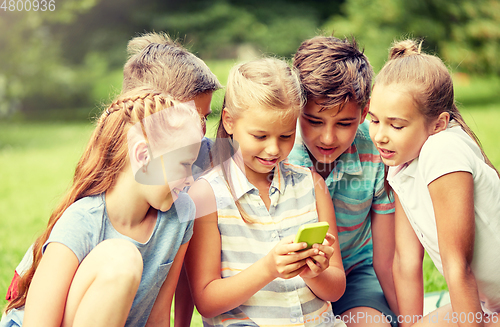 Image of kids or friends with smartphone in summer park