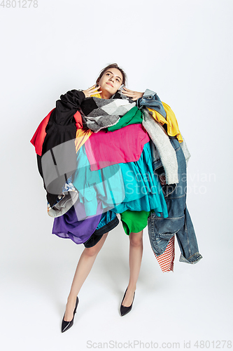 Image of Woman addicted of sales and clothes, overproduction and crazy demand