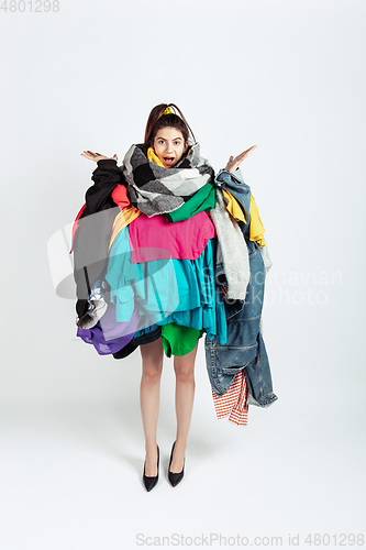 Image of Woman addicted of sales and clothes, overproduction and crazy demand