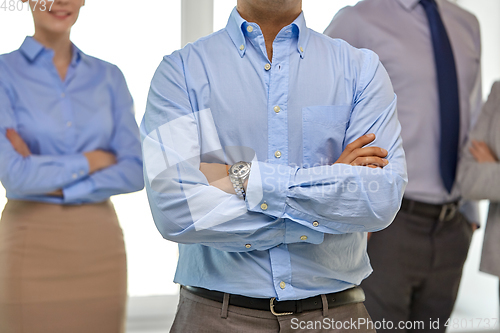 Image of close up of smiling business people at office