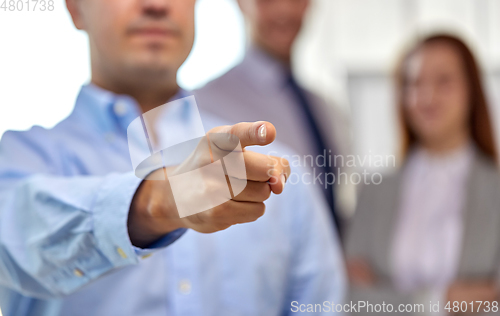 Image of close up of businessman pointing finger