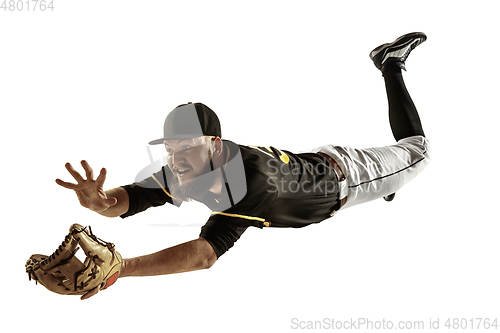 Image of Baseball player, pitcher in a black uniform practicing on a white background.