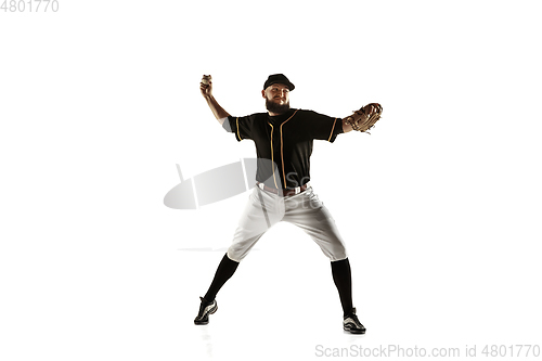 Image of Baseball player, pitcher in a black uniform practicing on a white background.