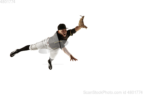 Image of Baseball player, pitcher in a black uniform practicing on a white background.