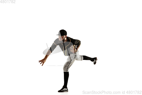 Image of Baseball player, pitcher in a black uniform practicing on a white background.