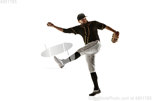 Image of Baseball player, pitcher in a black uniform practicing on a white background.