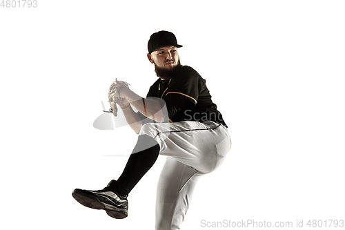 Image of Baseball player, pitcher in a black uniform practicing on a white background.