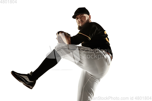 Image of Baseball player, pitcher in a black uniform practicing on a white background.