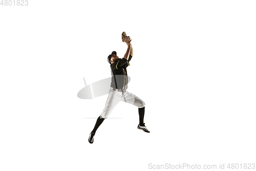 Image of Baseball player, pitcher in a black uniform practicing on a white background.