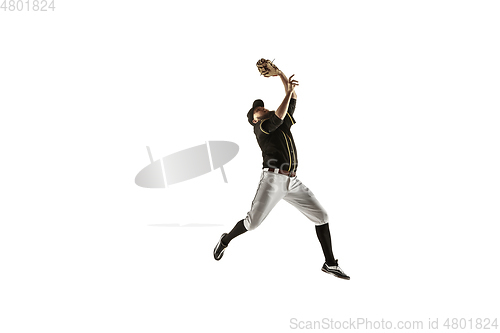 Image of Baseball player, pitcher in a black uniform practicing on a white background.