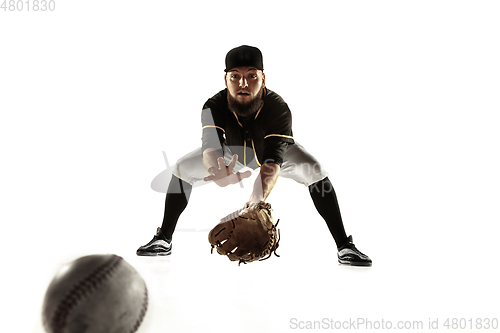 Image of Baseball player, pitcher in a black uniform practicing on a white background.