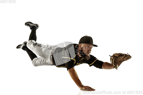 Image of Baseball player, pitcher in a black uniform practicing on a white background.