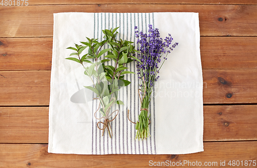 Image of greens, spices or medicinal herbs on towel