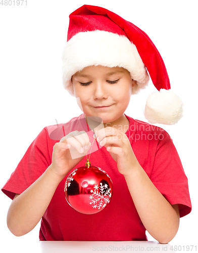 Image of Young happy girl in christmas cloth