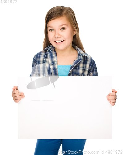 Image of Little girl is holding a blank banner