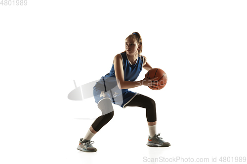 Image of Young caucasian female basketball player against white studio background