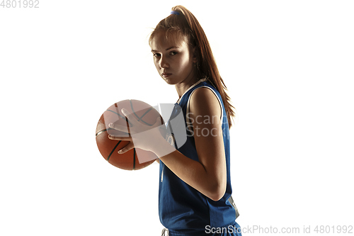 Image of Young caucasian female basketball player against white studio background