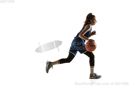 Image of Young caucasian female basketball player against white studio background