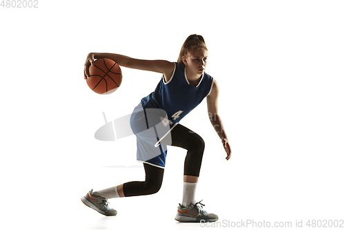 Image of Young caucasian female basketball player against white studio background