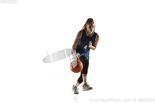 Image of Young caucasian female basketball player against white studio background