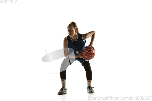 Image of Young caucasian female basketball player against white studio background