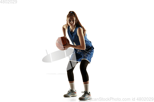 Image of Young caucasian female basketball player against white studio background