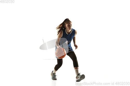 Image of Young caucasian female basketball player against white studio background