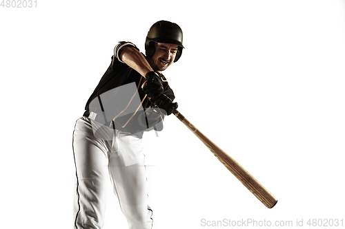 Image of Baseball player, pitcher in a black uniform practicing on a white background.