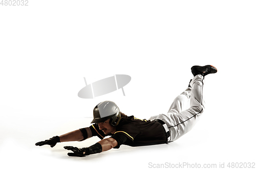 Image of Baseball player, pitcher in a black uniform practicing on a white background.