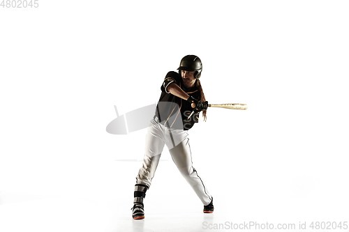 Image of Baseball player, pitcher in a black uniform practicing on a white background.