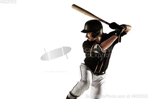 Image of Baseball player, pitcher in a black uniform practicing on a white background.